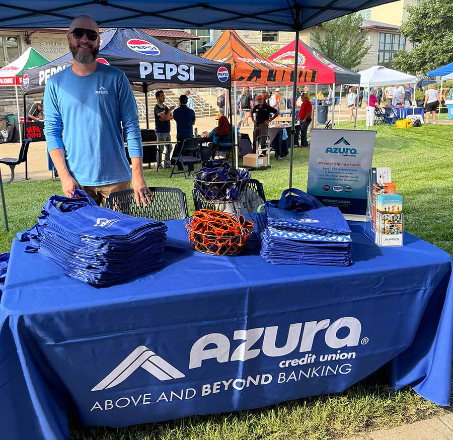 Azura booth and table at an outdoor event