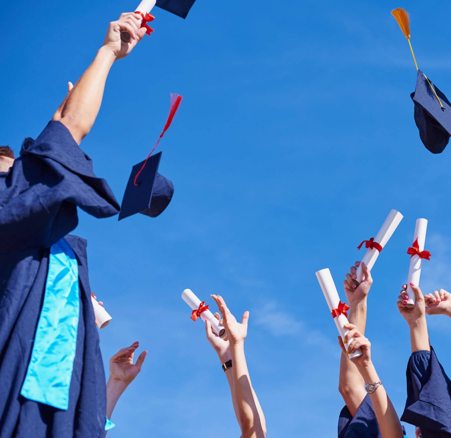 graduates celebrating