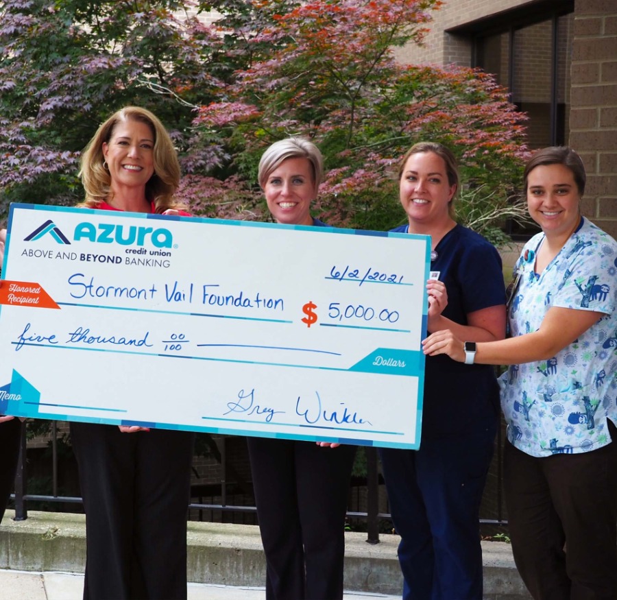 Azura employees supporting Stormont Vail health check presentation