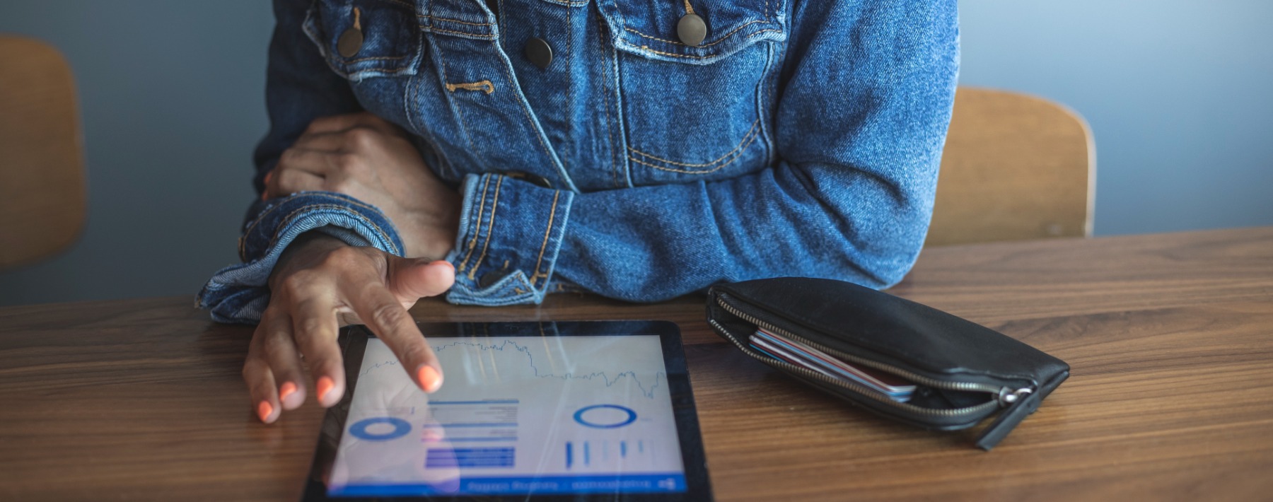 a person scrolling on their tablet