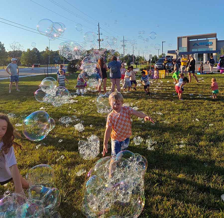 Azura Olathe branch event kids with lots of bubbles