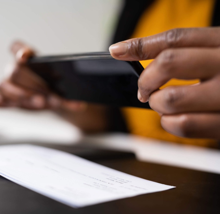 a person making a mobile deposit