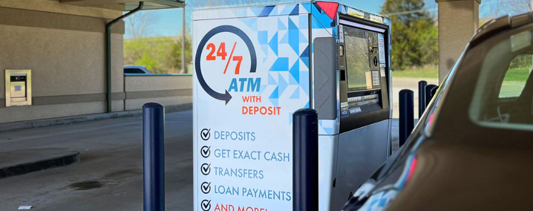 car at a drive-thru ITM at an Azura branch